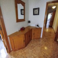 COCHERA-LOCAL CON VIVIENDA ARRIBA